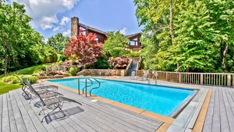 Property building, Patio, Spring, Day, Natural landscape, Pool view, Swimming pool, sunbed