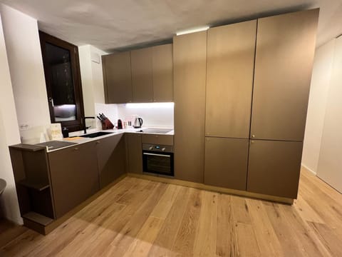 Kitchen or kitchenette, oven