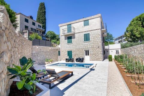 Property building, Patio, Spring, Day, Garden, Swimming pool