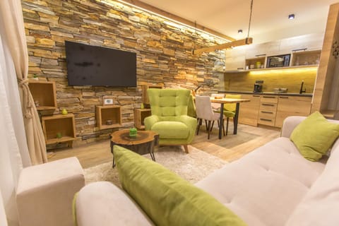 Kitchen or kitchenette, Living room, Seating area, Dining area