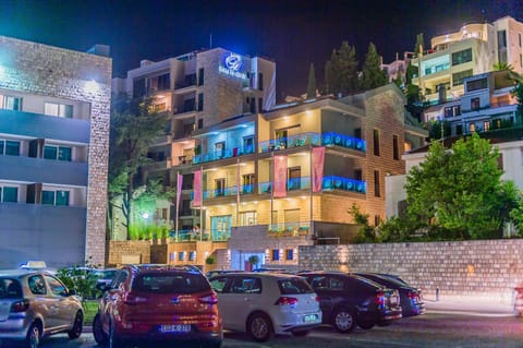 Property building, Nearby landmark, Night, Summer