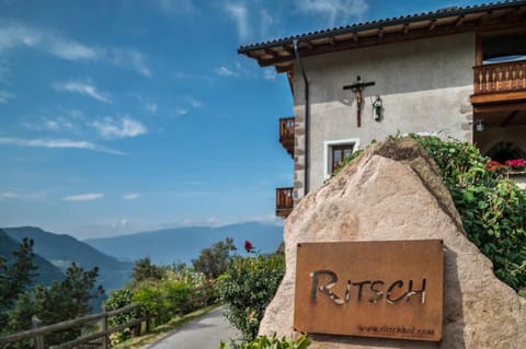 Property building, Day, Property logo or sign, Natural landscape, Mountain view