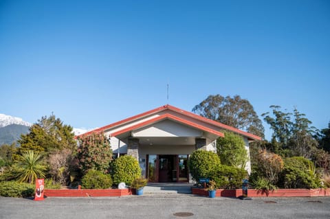 Property building, Text overlay, Mountain view