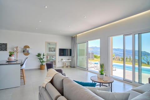 Natural landscape, TV and multimedia, Living room, Seating area, Sea view, Swimming pool