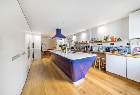 Kitchen or kitchenette, dishwasher, oven, stove