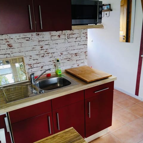 Kitchen or kitchenette, stove