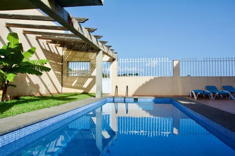Property building, Patio, Swimming pool