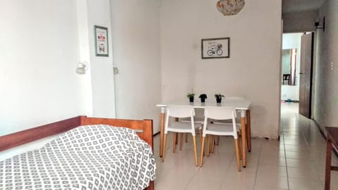 Bed, Living room, Seating area, Dining area