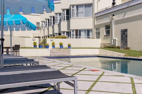 Property building, Pool view, Swimming pool, sunbed
