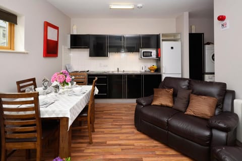 Kitchen or kitchenette, Living room, Seating area, Dining area, stove, toaster