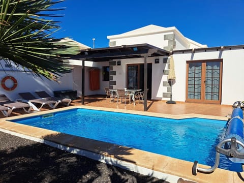 Property building, Living room, Swimming pool