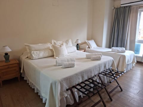 Bed, Photo of the whole room, Bedroom, towels, air conditioner
