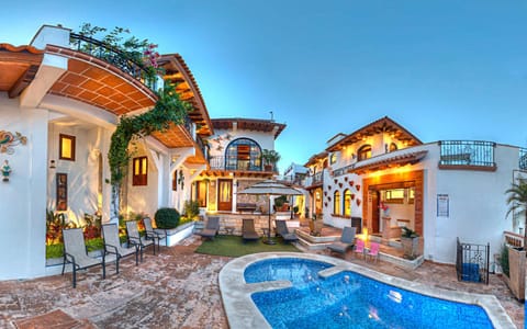 Property building, Patio, Pool view, Swimming pool, sunbed