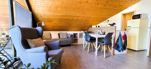 Kitchen or kitchenette, Living room, Photo of the whole room, Seating area, Dining area, microwave, kitchen