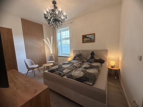 Bed, Living room, Seating area, Bedroom