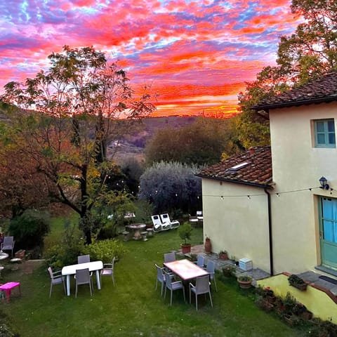 Property building, Patio, Day, Natural landscape, Garden, Dining area, Garden view, Mountain view, Sunset