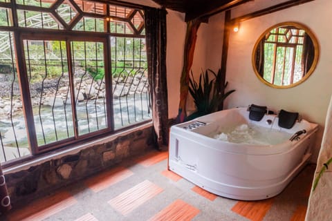 Bed, Natural landscape, Hot Tub, Photo of the whole room, River view