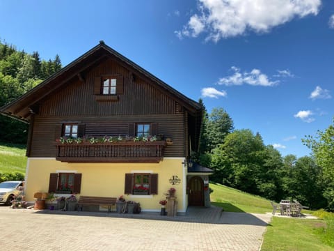 Property building, BBQ facilities, Seating area