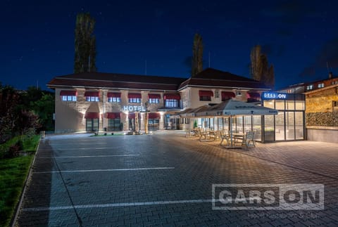 Property building, Night, View (from property/room), Text overlay