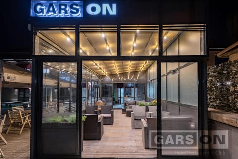 Night, Property logo or sign, Lobby or reception, Seating area, Logo/Certificate/Sign, Text overlay