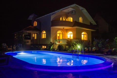 Property building, Night, Swimming pool