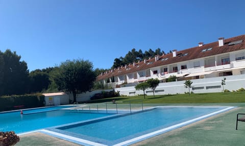 Property building, Pool view, Swimming pool, sunbed