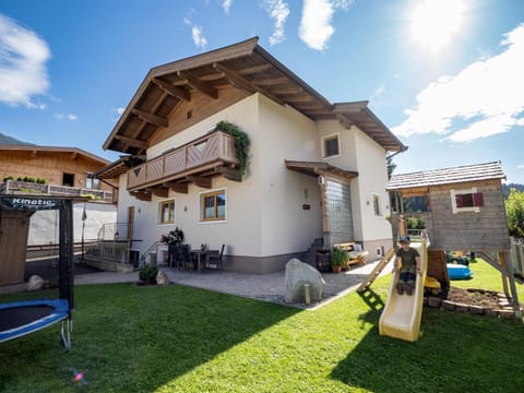 Property building, Patio, Facade/entrance, Day, Summer, Children play ground, Garden, Seating area, Dining area, Garden view, children, young children, older children