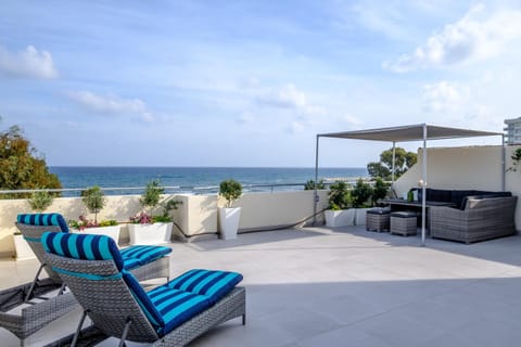 Patio, Balcony/Terrace, Seating area, Beach, Sea view, sunbed