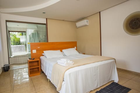 Bed, Photo of the whole room, Bedroom, towels, air conditioner