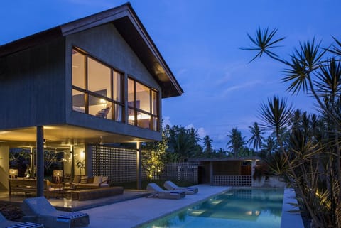 Property building, Patio, Night, Swimming pool, sunbed