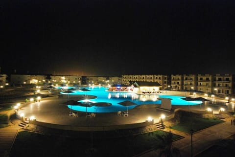 Property building, Night, Pool view, Swimming pool