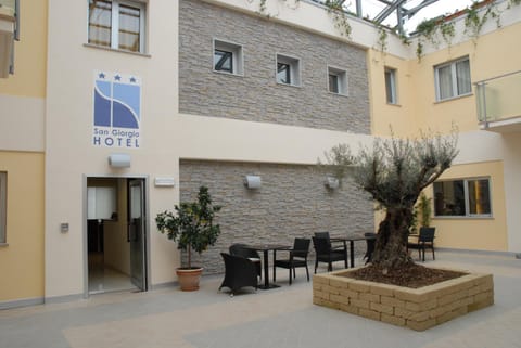Patio, Facade/entrance, Day, Property logo or sign