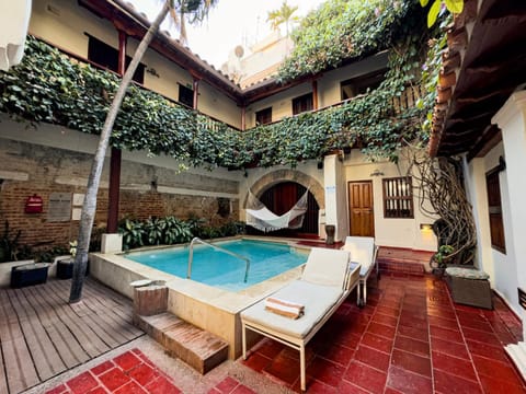 Patio, Day, Natural landscape, Pool view, Swimming pool, sunbed