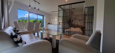 Bed, Living room, Seating area, Bedroom