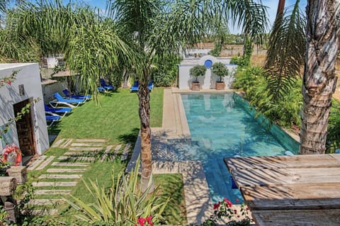 Property building, Living room, Swimming pool