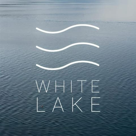 Property logo or sign, Natural landscape, Logo/Certificate/Sign, Text overlay, Lake view