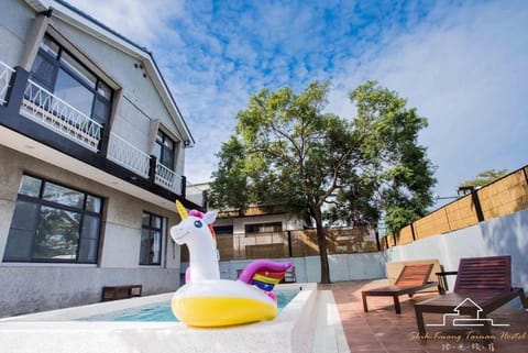 Property building, Patio, Day, Pool view, Swimming pool