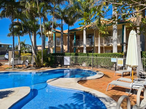 Property building, Pool view, Swimming pool, sunbed