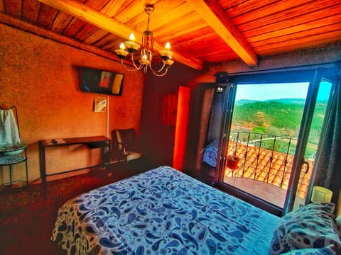 Bed, Natural landscape, TV and multimedia, Bedroom, Mountain view