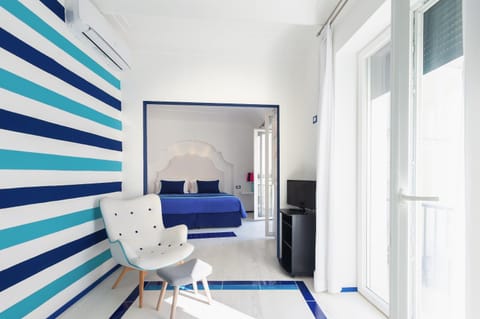 TV and multimedia, Photo of the whole room, Seating area, Bedroom, air conditioner