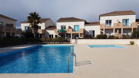 Property building, Pool view, Swimming pool, sunbed