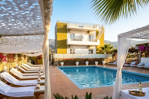 Property building, Day, Balcony/Terrace, Pool view, Swimming pool, sunbed
