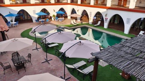 Patio, Day, Pool view, Swimming pool, sunbed