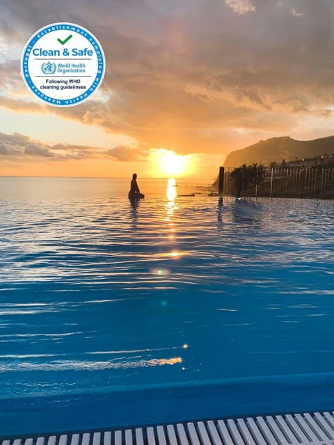 Property logo or sign, Pool view, Sea view, Swimming pool, Sunset, Certificate/Award