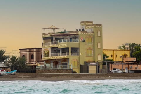 Property building, Day, Natural landscape, Beach, Sea view
