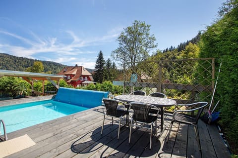 Property building, Living room, Swimming pool