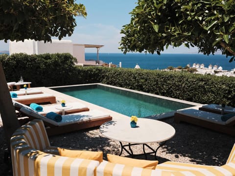 View (from property/room), Seating area, Sea view, Swimming pool