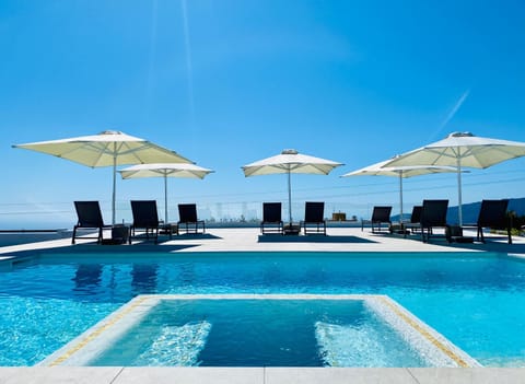 Off site, Day, Hot Tub, Solarium, Sea view, Swimming pool, Swimming pool, sunbed