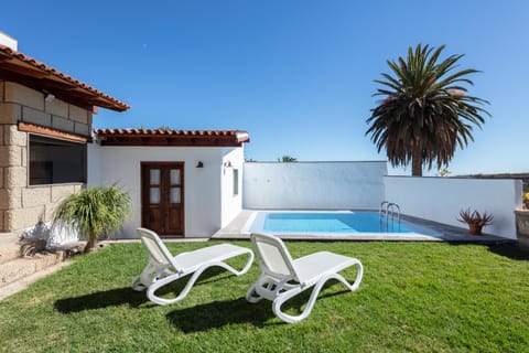 Property building, Patio, Garden, Swimming pool