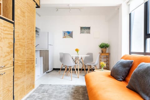 Kitchen or kitchenette, Living room, Seating area, Dining area
